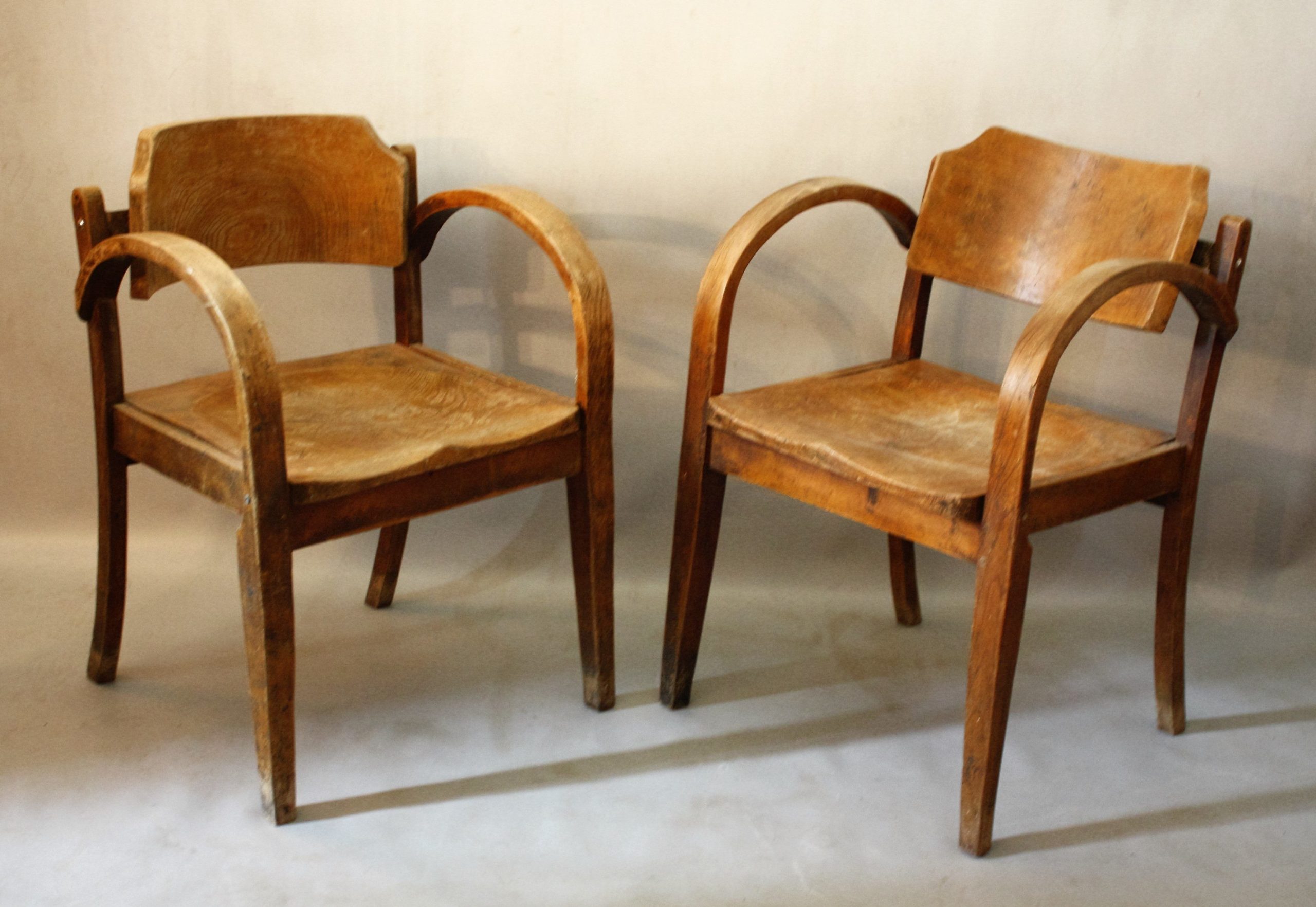 A Pair of Utiliterian Oak Chairs